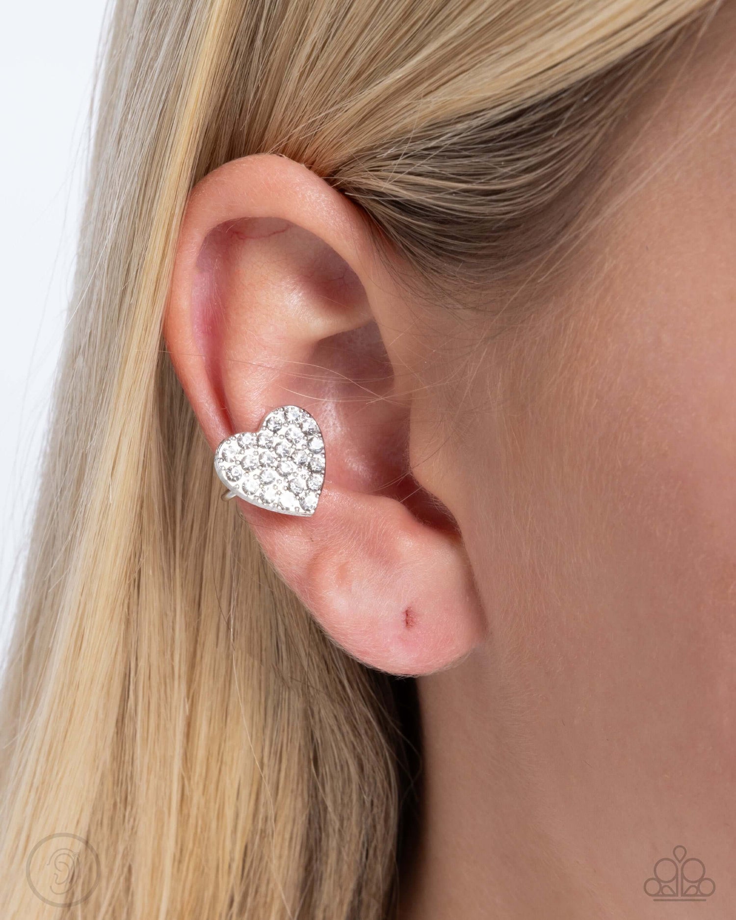 As Far As It GLOWS - White Paparazzi Heart Ear Cuff Earring $5 Jewelry with Janet Morgan Jewelry